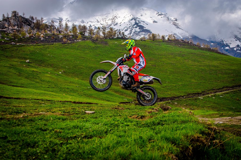 A man on a Dirt Bike jumping 